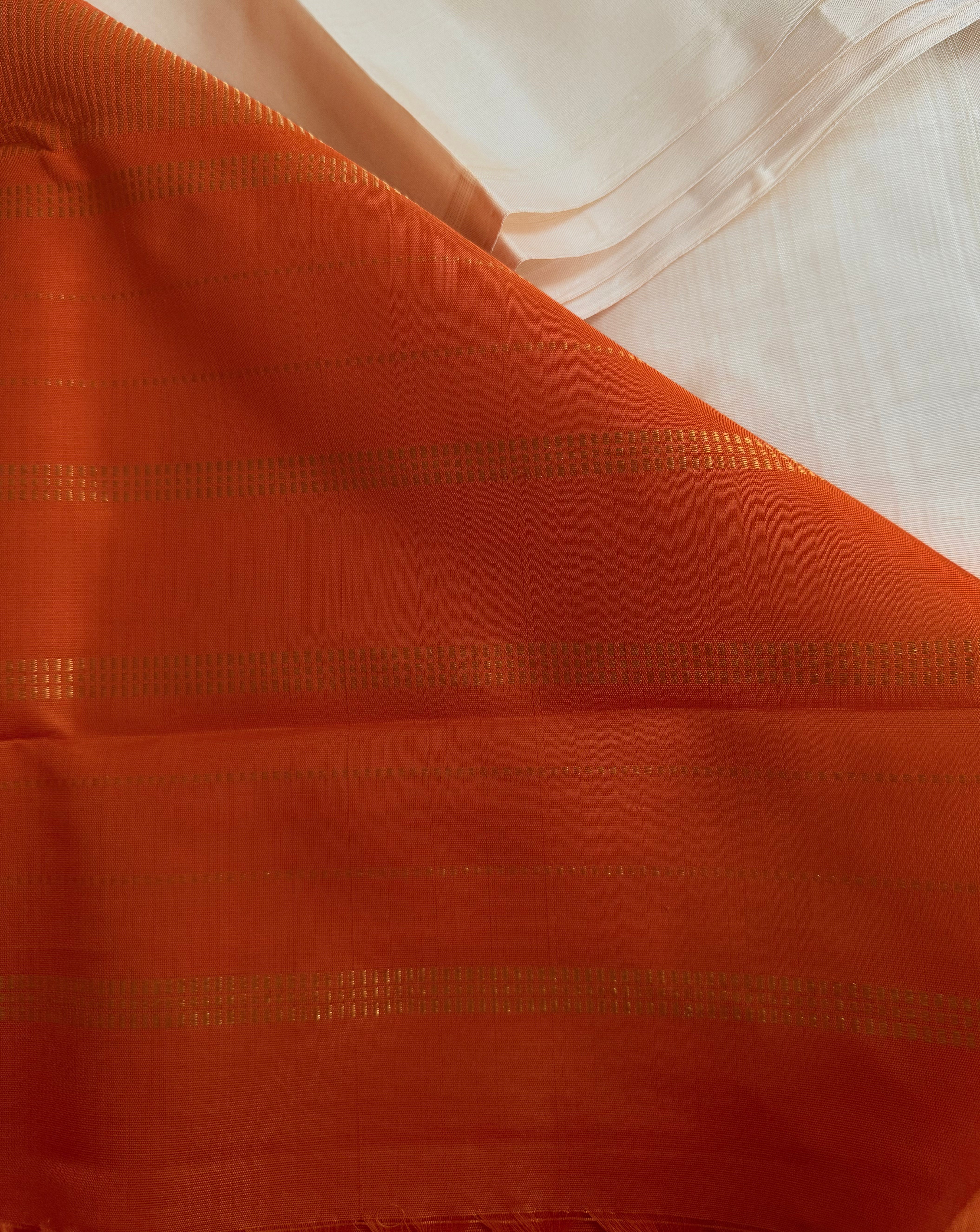Charunetra | White and Orange Kanjivaram Silk Saree