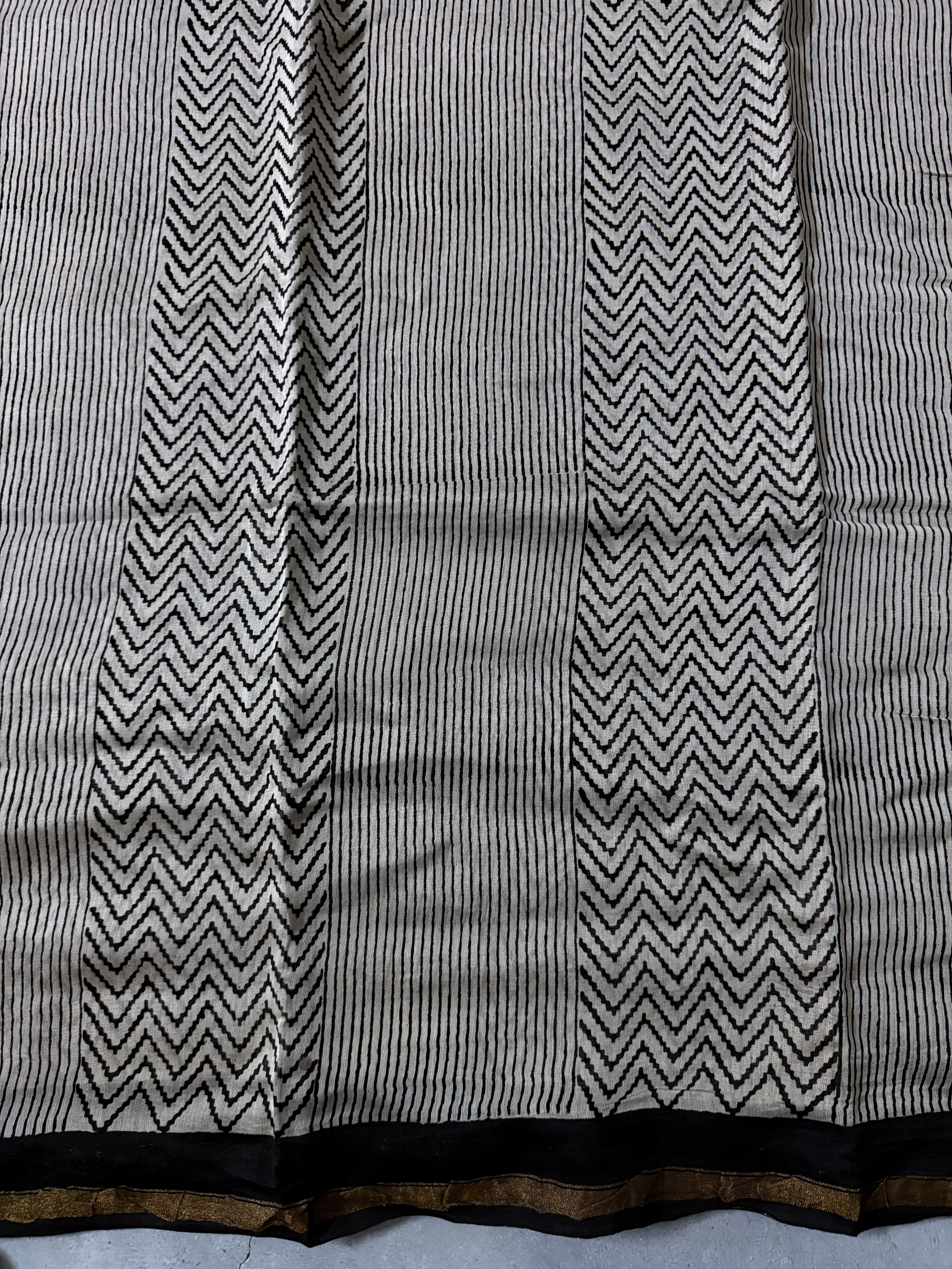 Kairavi | Beige and Black Geometric Block Printed Chanderi Saree