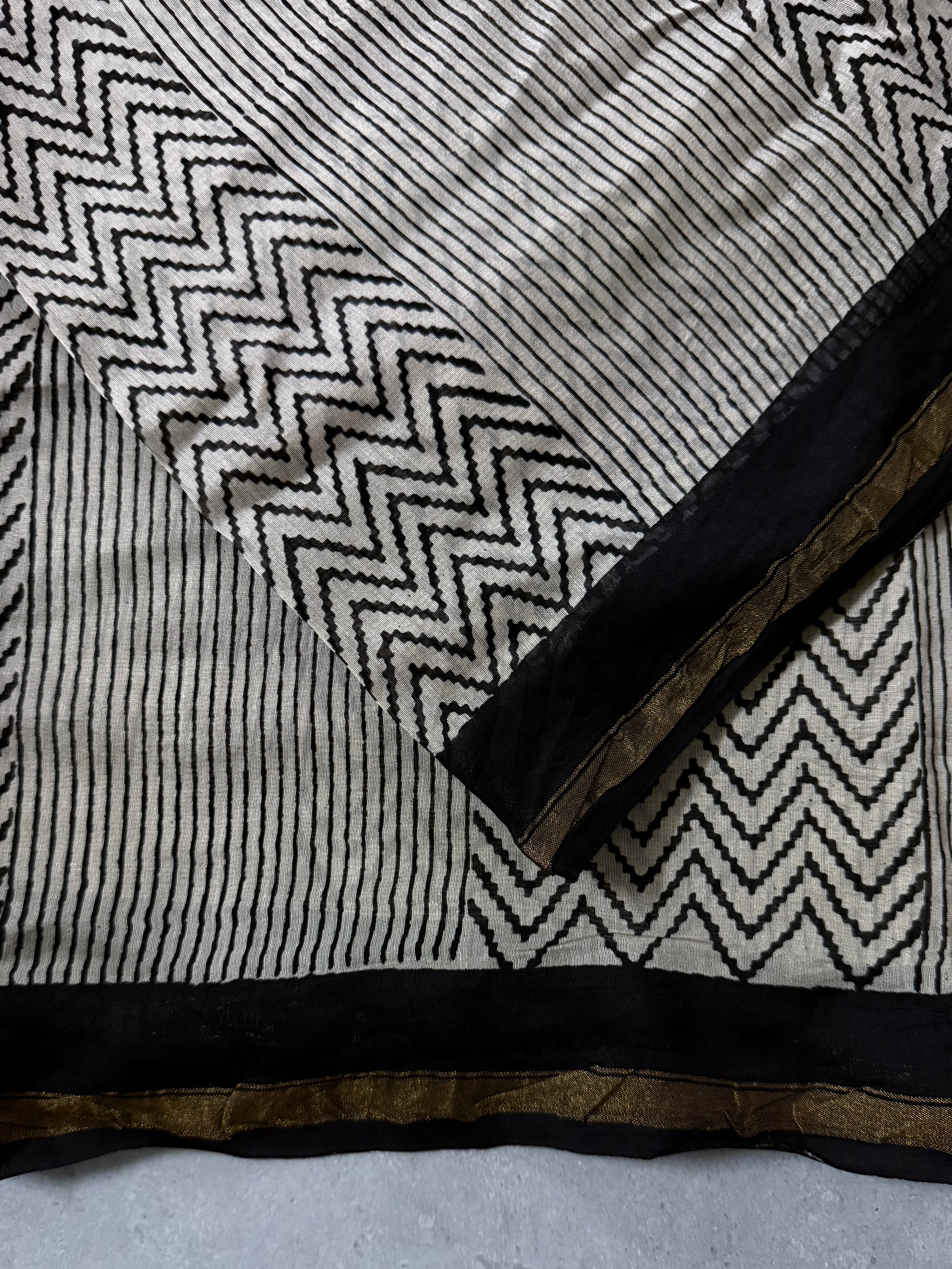 Kairavi | Beige and Black Geometric Block Printed Chanderi Saree
