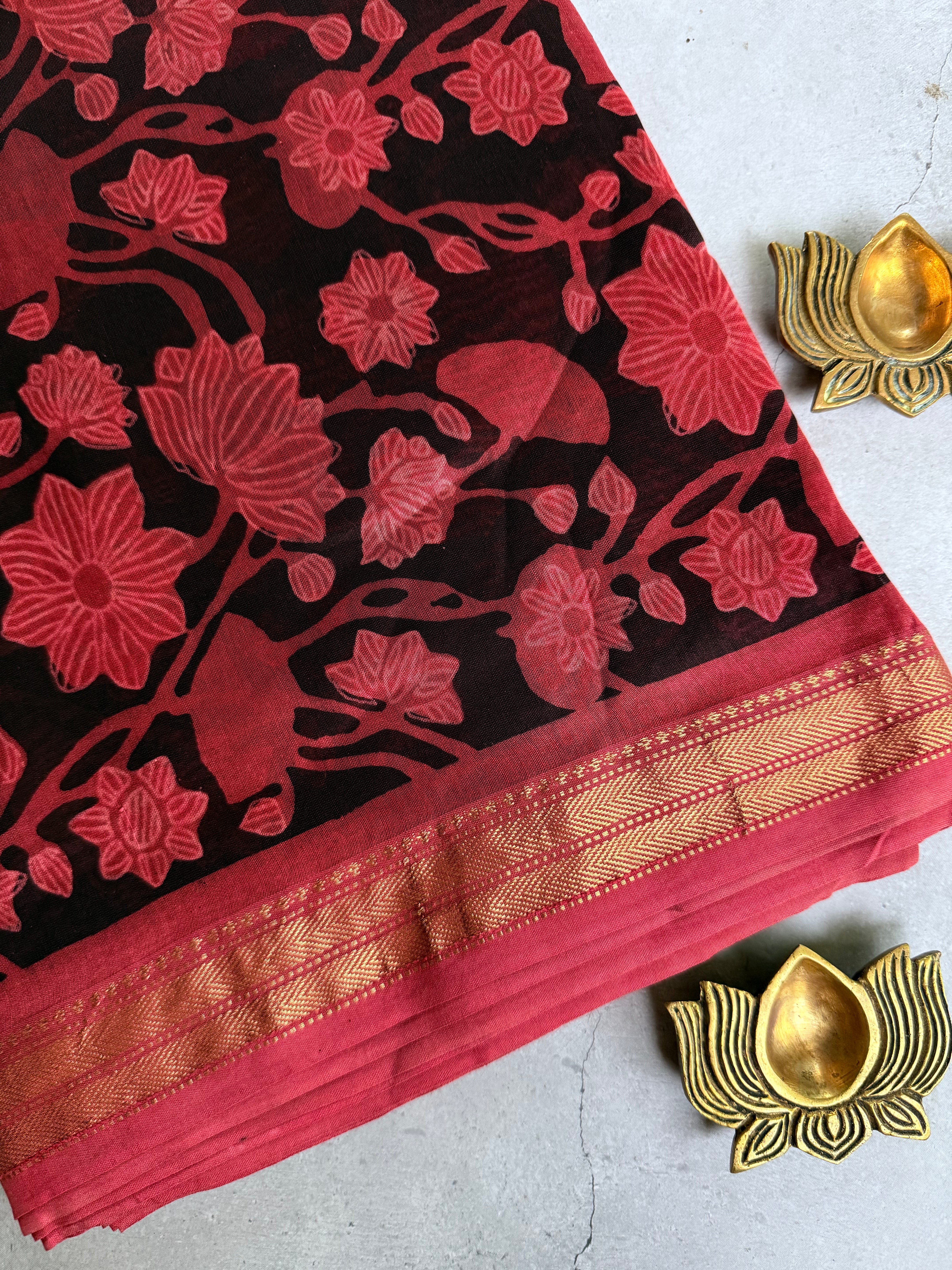 Vaidehi | Saffron and Black Block Printed Maheshwari Saree