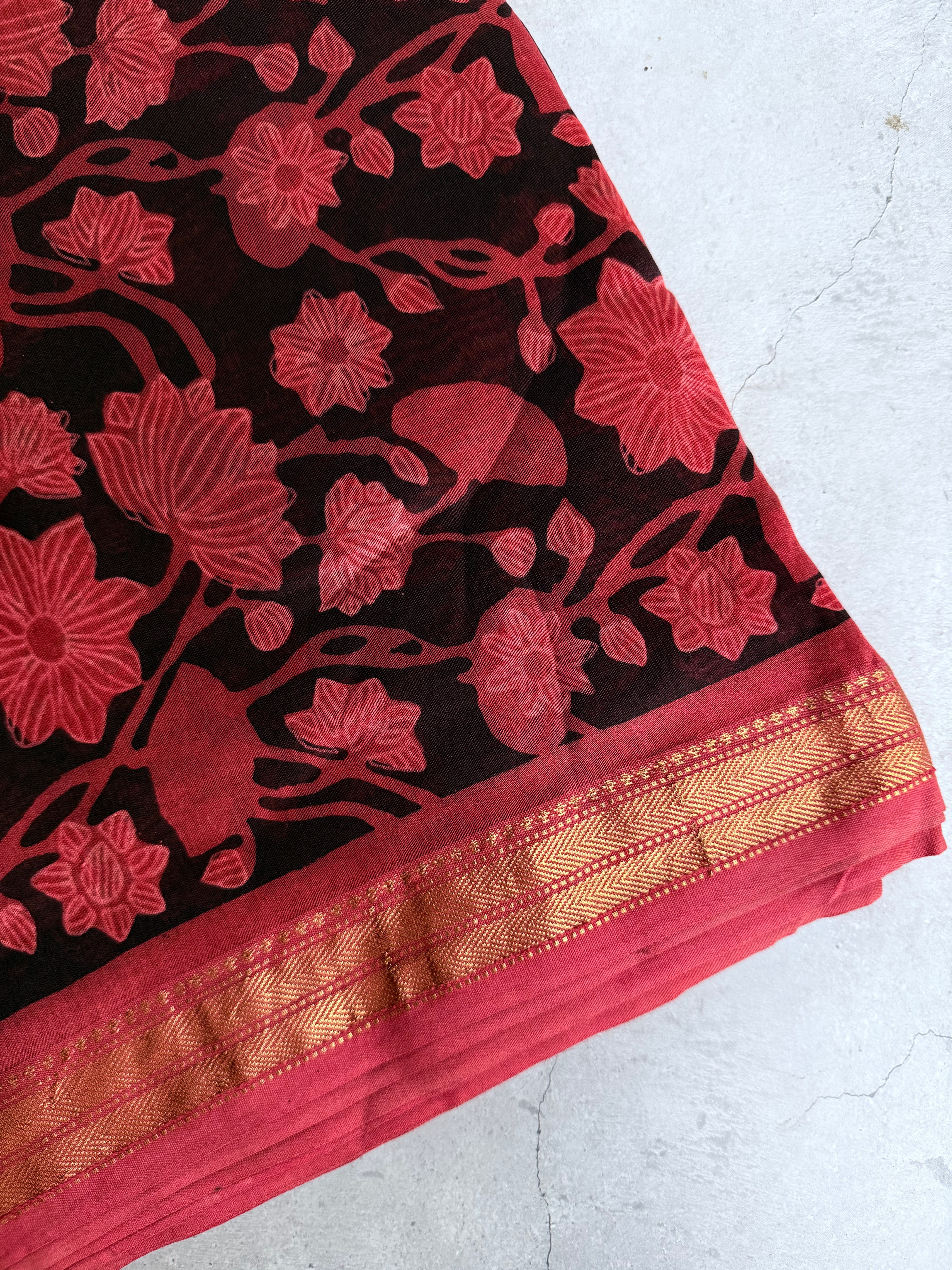 Vaidehi | Saffron and Black Block Printed Maheshwari Saree