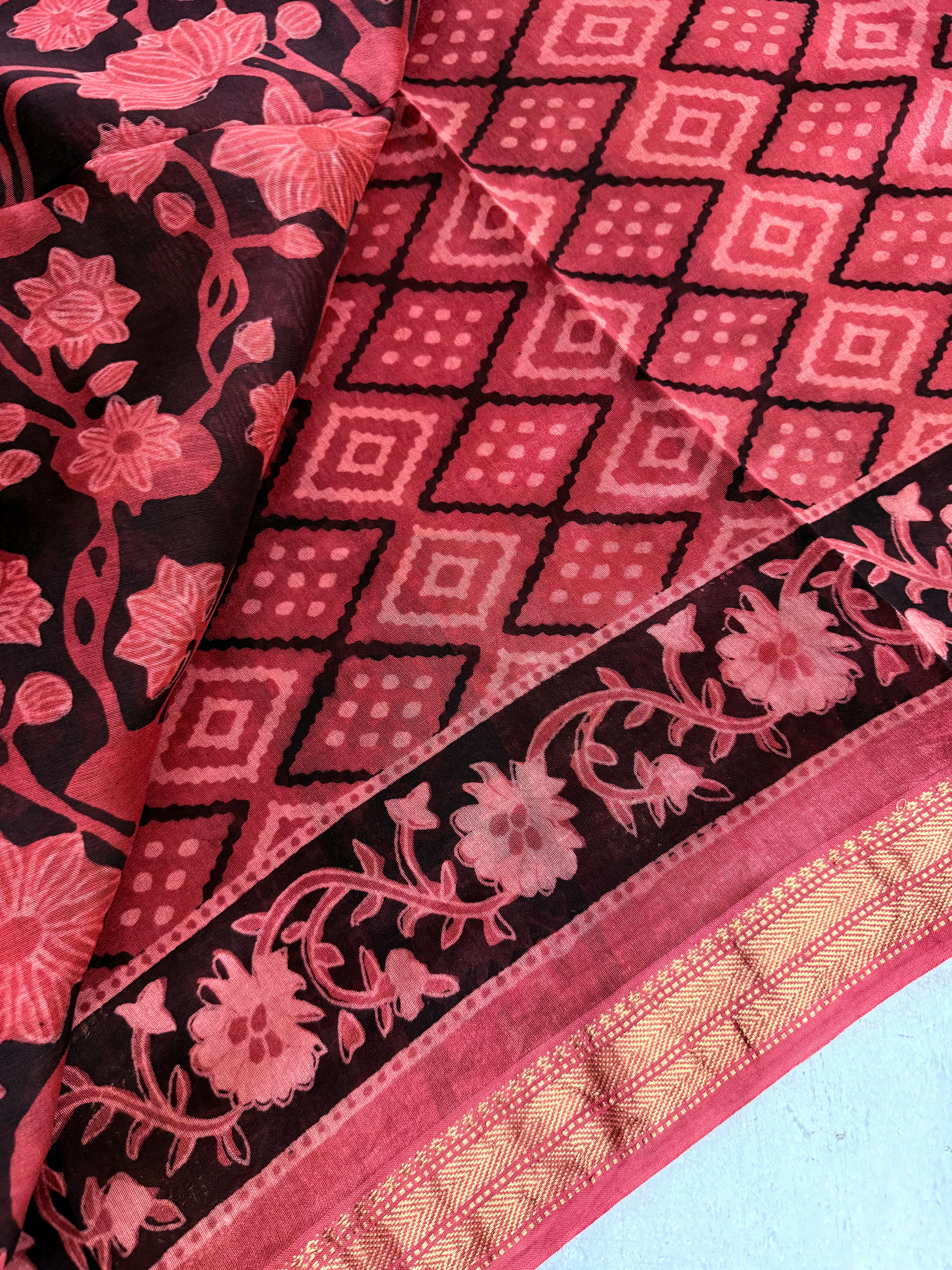 Vaidehi | Saffron and Black Block Printed Maheshwari Saree