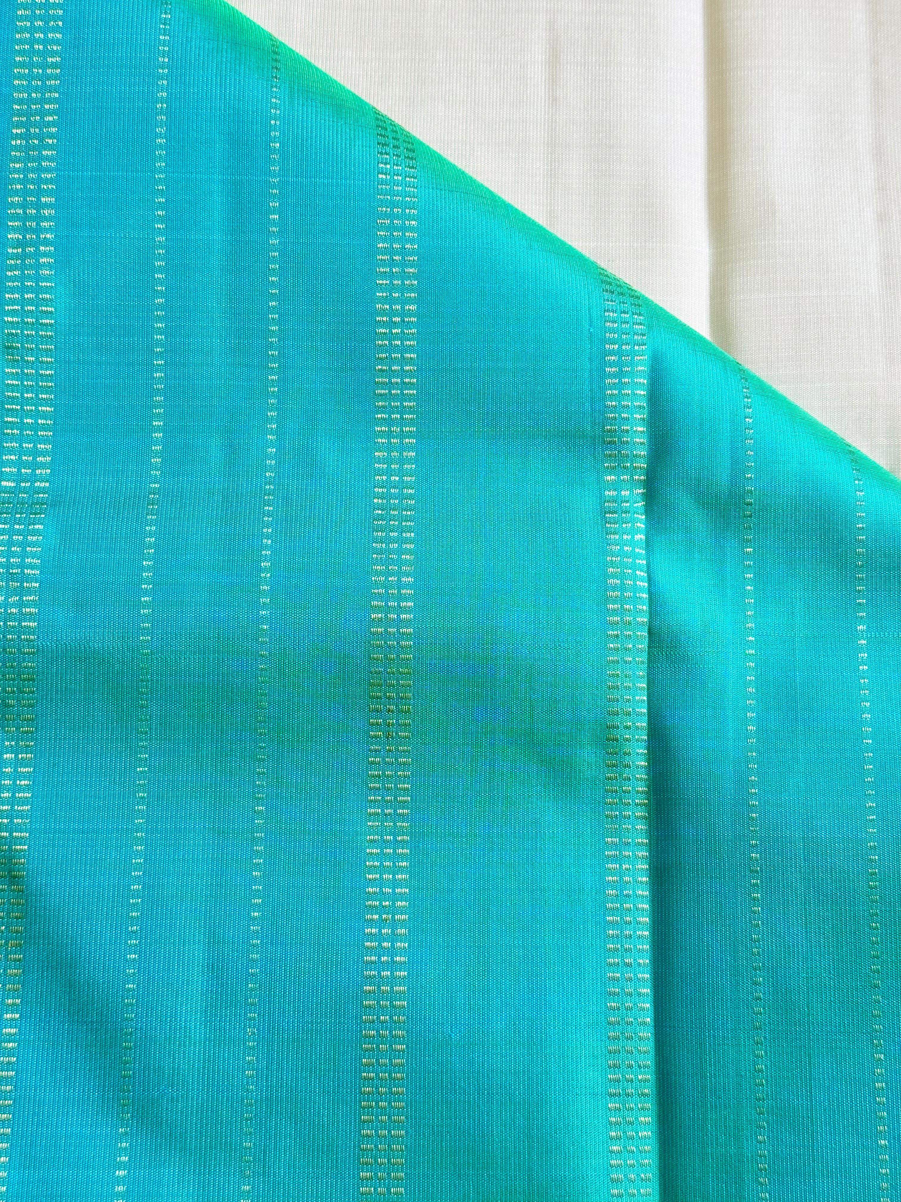 Nakshatra | White and Green Kanjivaram Silk Saree